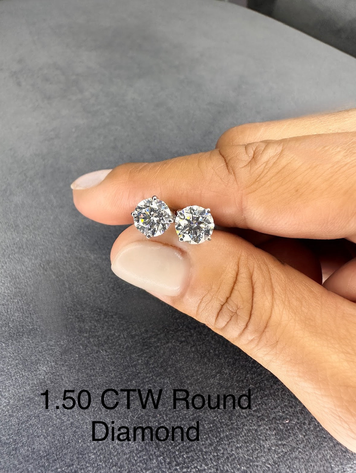 Platinum 4-Prong Round Cut Diamond Stud Earrings 1.50 ct. tw. (G-H, VS)