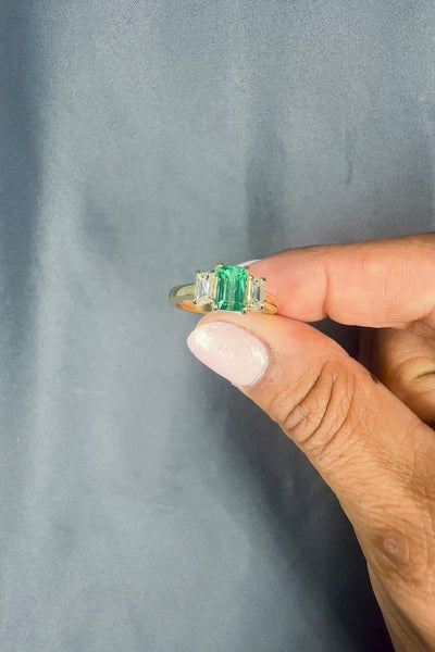 Three Stone 7x5MM Emerald Cut Natural Green Emerald & 0.50 Ct. Tw. Side Diamonds