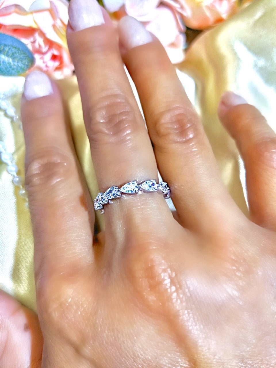 Pear shaped diamond eternity band deals