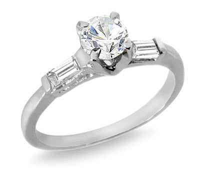 0.85 Ct. Tw. Round Cut with Baguette Cut Three Stone Diamond Ring